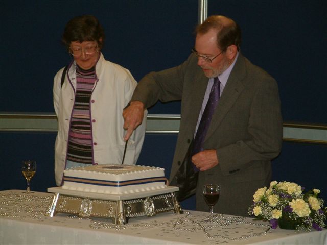 David Burton cuts the cake
